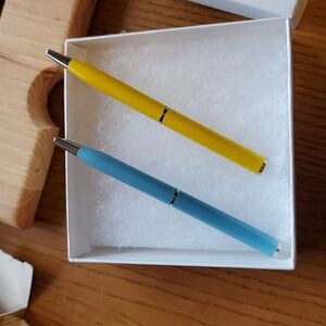 Two Coach Mini ballpoint pens Yellow And Blue New